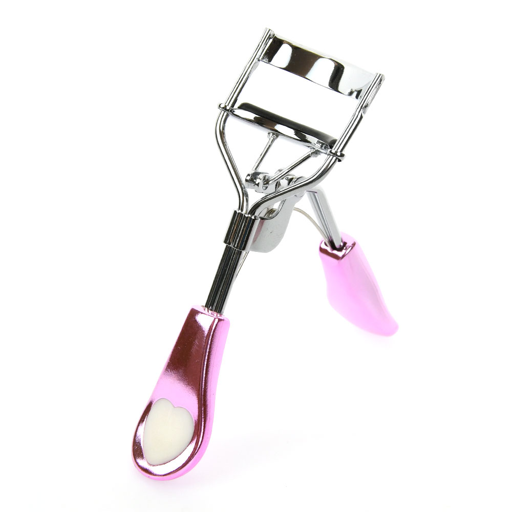 Pink Heart Handle Eyelash Curler med indbygget kam